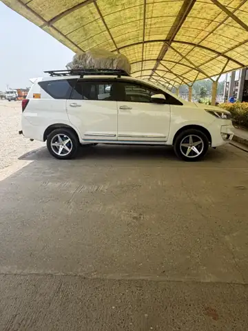 Innova Crysta Taxi with Roof Carrier for Uttarakhand Tours